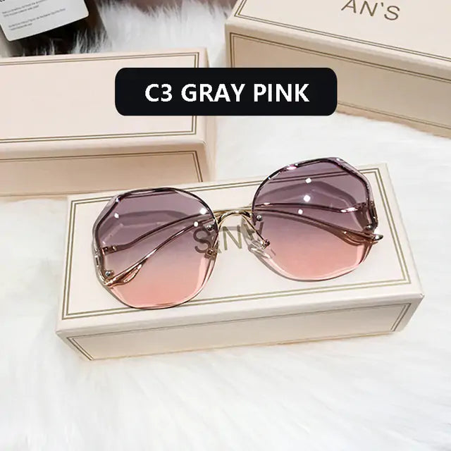 Lunettes de soleil à verres taillés